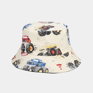 Close-up of children cotton bucket hat with colorful monster truck and traffic cone print