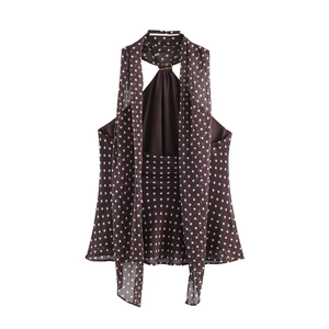 Polka dot halter top in dark brown with elegant long neck ties on a clean white background