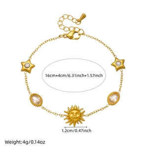 Gold stainless steel sun and star bracelet with crystal charms on white background