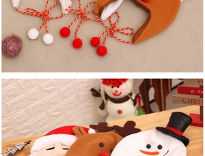 Detailed view of Christmas headbands featuring Santa, reindeer, and snowman felt designs