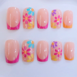 French floral press-on nails in pink with colorful flower patterns and square shape