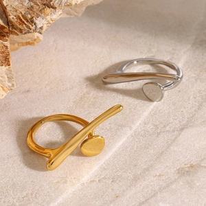 Minimalist irregular stainless steel rings in gold and silver with industrial design