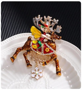 Detailed Christmas reindeer brooch with enamel elf and hanging snowflake charm