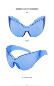 Close-up of light blue one-piece oversized butterfly frame cycling sunglasses from two angles