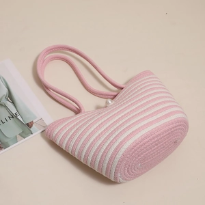 Pink and white striped cotton woven shoulder bag with elegant pearl details for beach vacation