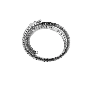 Silver stainless steel cuban chain necklace with lobster clasp in a coiled arrangement