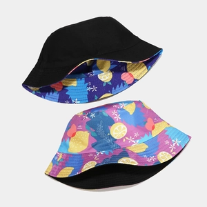 Reversible bucket hat with lemon pattern and solid black for summer sun protection