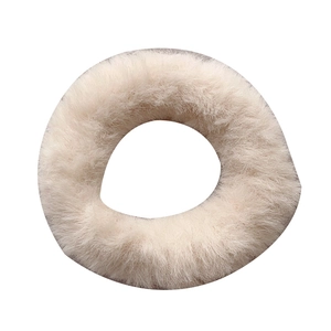 Plush faux fur scrunchie in cream white with high elasticity for ponytails