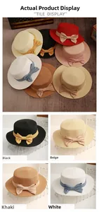 Detailed texture of woven straw sun hat with striped ribbon bow for summer travel