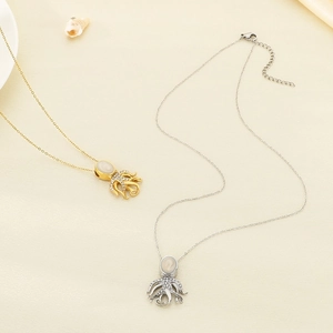 Elegant gold and silver octopus ocean necklaces with crystals and oval pearls for women