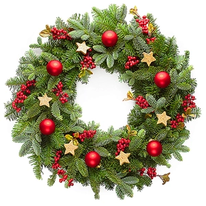 Detailed view of festive Christmas wreath with pine needles, red berries and gold stars