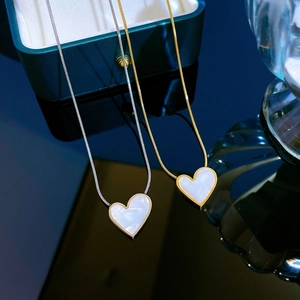 Minimalist heart mother of pearl necklace in gold and silver finish with snake chain