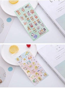 Detail of cartoon cow and duck 3D bubble stickers in clear OPP packaging with prop magazine