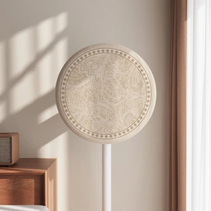 Detail of round linen dust cover featuring vintage floral patterns and lace edge for fans