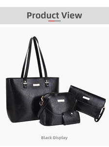 Detailed view of the 4-piece black tote and crossbody bag set with gold hardware and textures