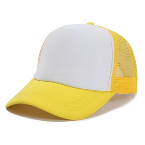 Detail of yellow and white mesh trucker hat with curved brim and breathable fabric texture