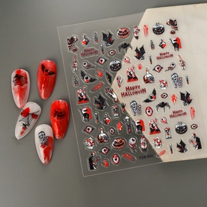 5D Halloween nail stickers with embossed bat and pumpkin patterns for spooky manicure