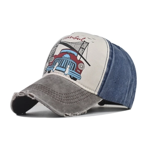 Detail of distressed brim and vintage Istanbul print on washed cotton baseball cap