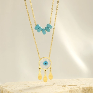 Dolagige goldene Edelstahl-Halskette mit blauem bösen Blick Auge und Muschelanhänger