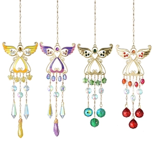 Detail of four colorful angel suncatchers with crystal beads and metal wing charms