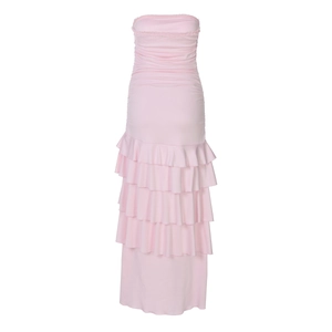 Detail of pink strapless maxi dress featuring tiered ruffles and pleated waist design