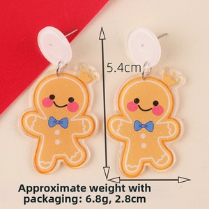 Detail view showing gingerbread man earrings with size 5.4cm and weight 6.8g