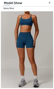 Navy blue seamless yoga set featuring a U-neck sports bra and high waisted fitness shorts