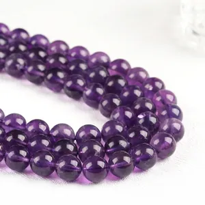 Natural deep purple Uruguay amethyst round beads with transparent texture and ice cracks