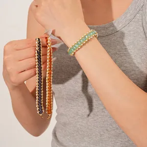 Bohemian beaded pearl bracelets in emerald, purple, and amber colors with gold accents