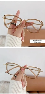 Detailed view of cat-eye glasses frame in red gold with elegant metal temples