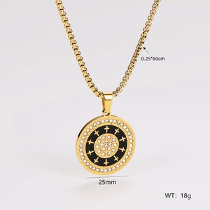 Detail of 25mm gold cross pendant with black enamel inlay and zircon stone accents