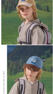 Detailed view of kids cartoon bear embroidery and premium stitching on a baseball cap