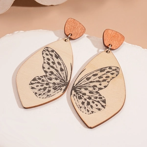 Vintage wooden drop earrings with butterfly wing prints and elegant silver pins