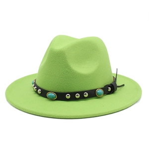 Detailed view of neon green felt hat with black leather belt and turquoise gemstone accents