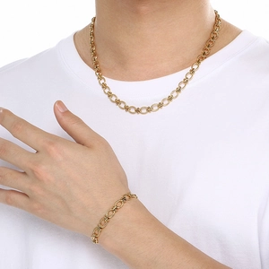 Textured 18K gold plated stainless steel chain necklace and bracelet set on model