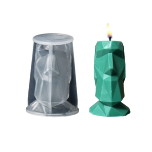 Moai siliconen mal en groene geometrische kaars voor DIY aromatherapie handwerkprojecten