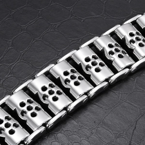 Punk style stainless steel skull link chain bracelet for men on black leather background