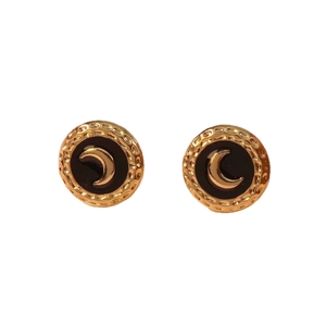 Vintage gold hammered earrings with black enamel disk and celestial crescent moon pattern
