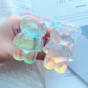 Holographic colorful bear phone grip holder with iridescent finish on transparent resin