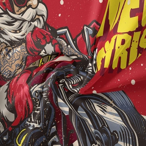 Macro detail of Bohemian Christmas tapestry showing woven fabric and biker Santa print