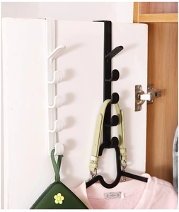 Detailed view of over-the-door multi-tier hooks in matte black and white finishes