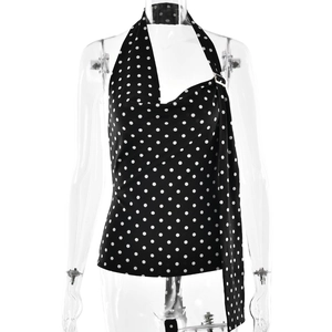 Haut licou vintage à pois noirs avec col en V et coupe cintrée pour un look rétro chic