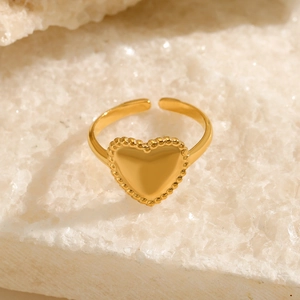 Minimalist 18K gold plated heart ring with beaded edge on white crystal stone