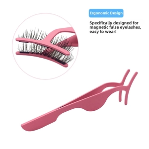 Detail view of pink matte magnetic eyelash applicator with precise tweezer tip design