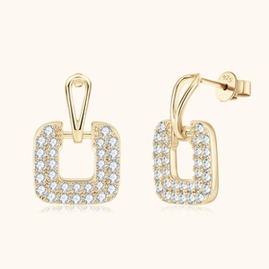 Detail shot of gold S925 silver earrings with pavé moissanite and S925 hallmark