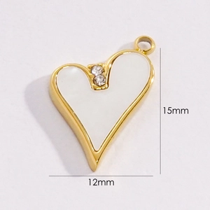 Detail of heart-shaped 14K gold pendant with dimensions 15mm by 12mm on white background