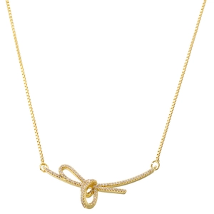 Elegant gold-plated bow necklace with cubic zirconia pave pendant on a box chain