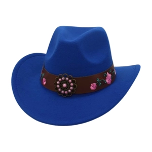 Detail of royal blue western cowboy hat with floral embroidery and metallic flower ornament