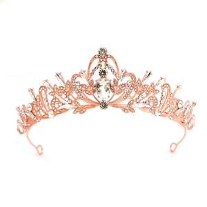 Detailed view of luxury rose gold bridal tiara with sparkling crystal teardrop accents