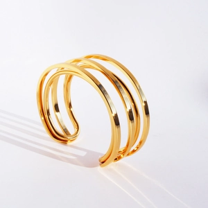 Minimalist double-layered gold plated brass cuff bracelet with streamlined geometric design